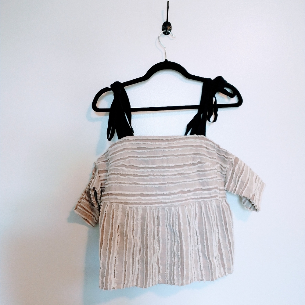 Moon River striped beige and white babydoll style top. Cold shoulder with straps